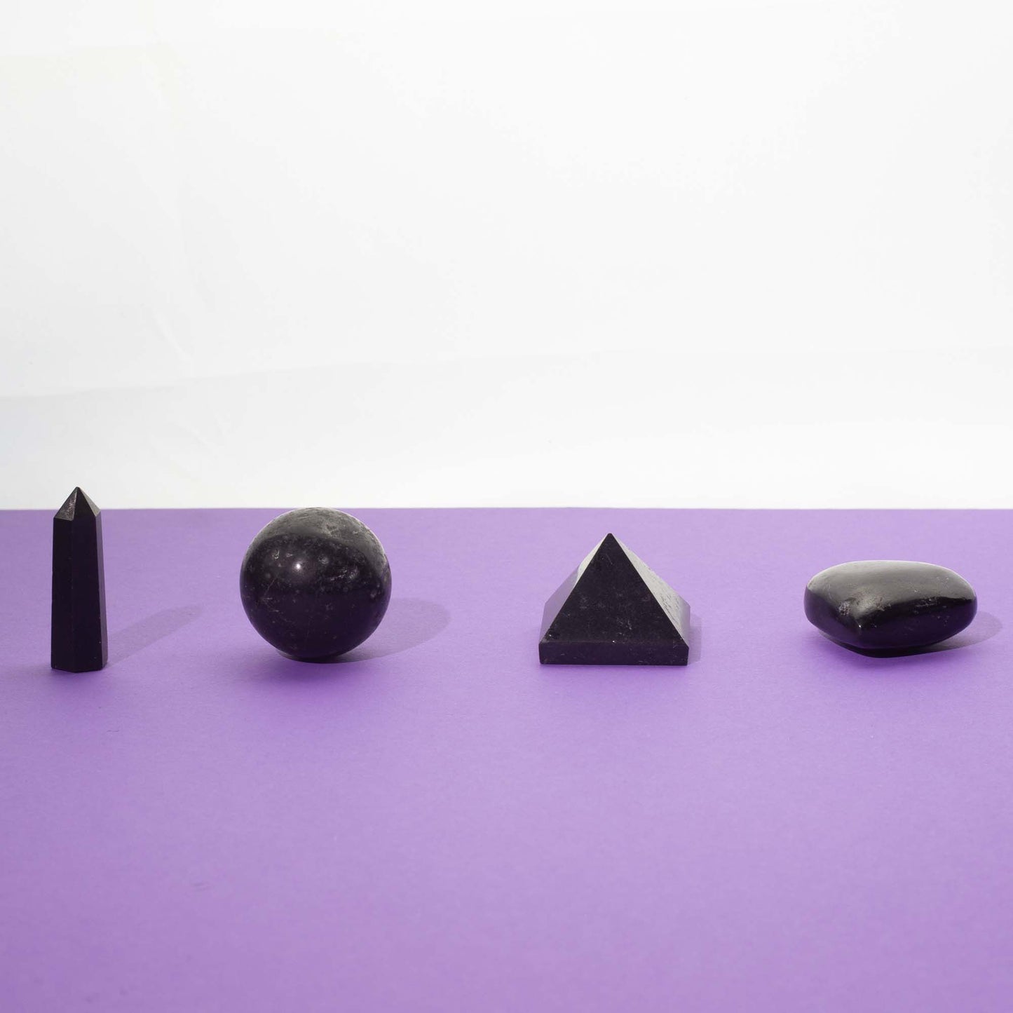 Pierre brute — Quatre formes · Tourmaline noire