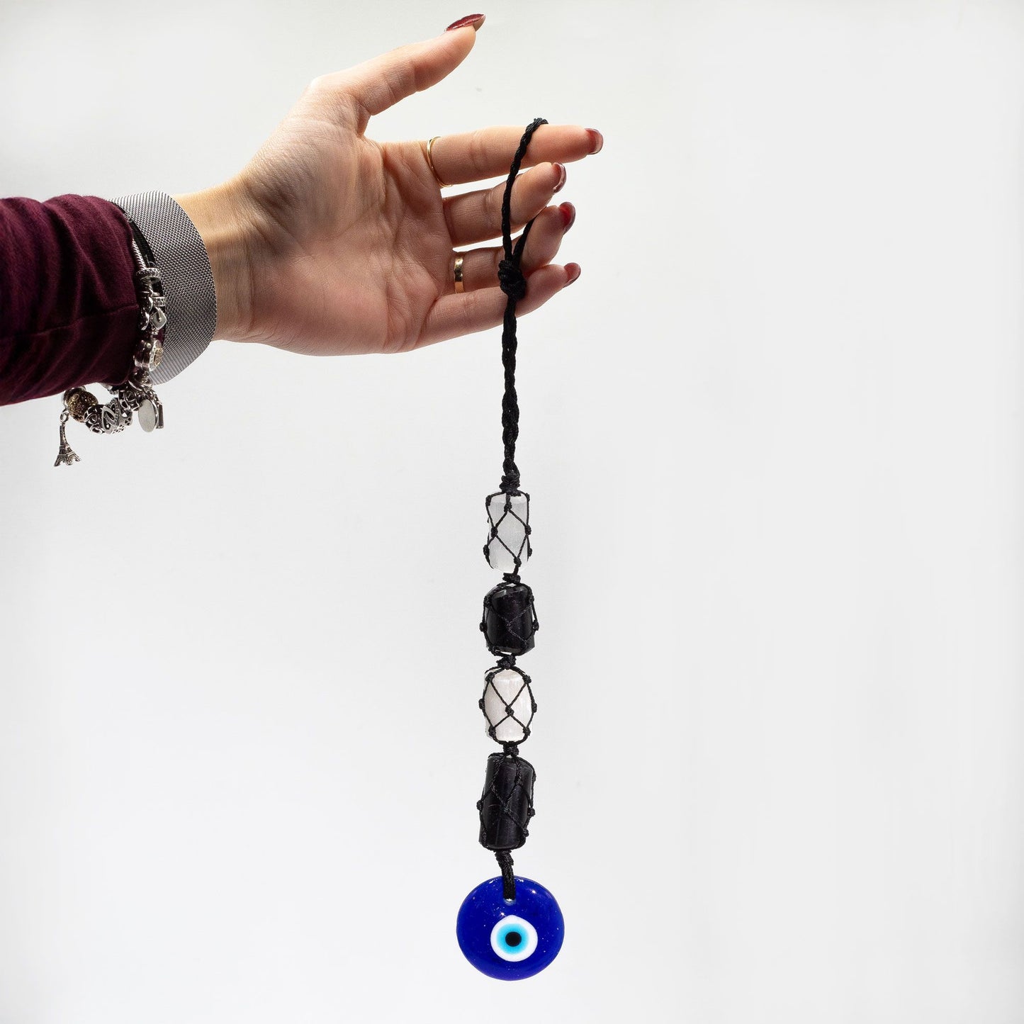 Pendentif de pierre — Tourmaline noire & sélénite polies · Œil turc