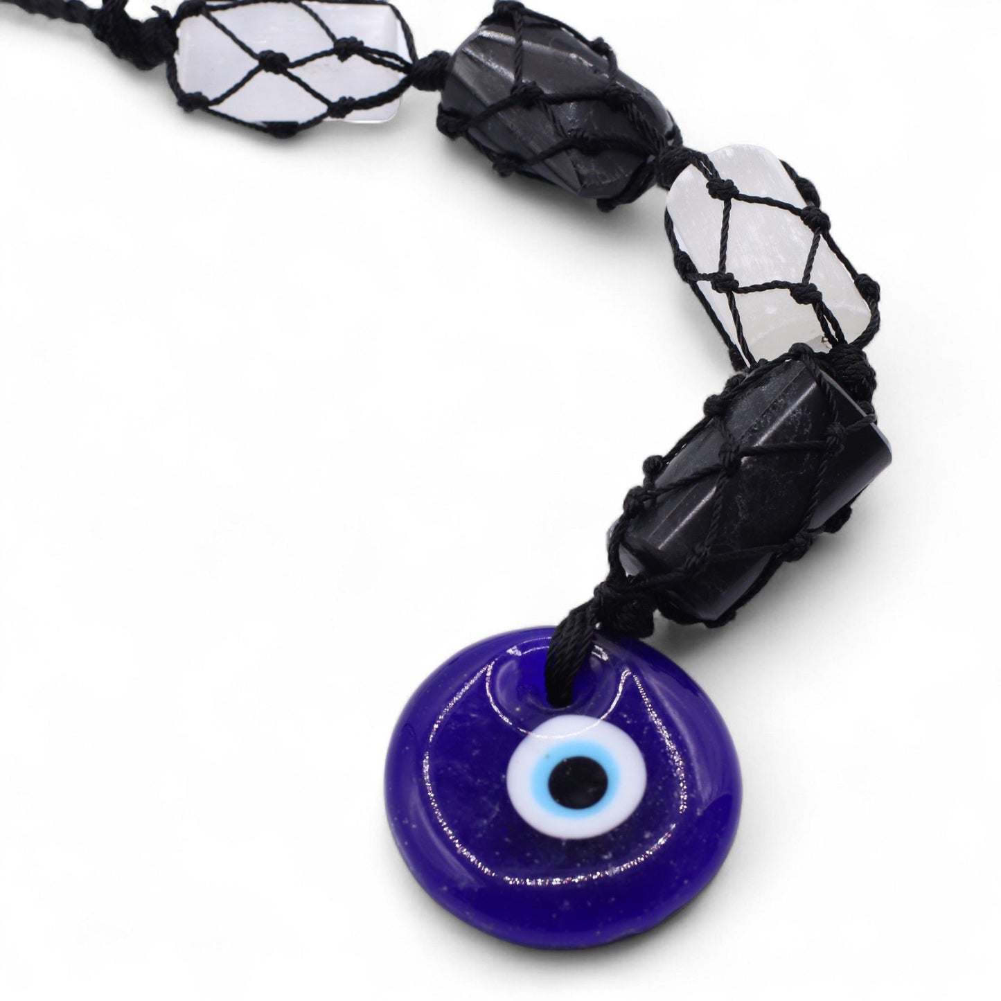 Pendentif de pierre — Tourmaline noire & sélénite polies · Œil turc