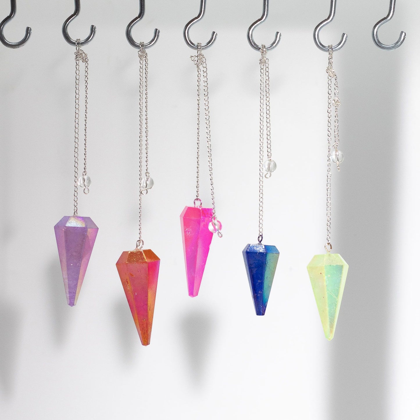 Pendule à six faces — Cristal aurore rose · 4 cm