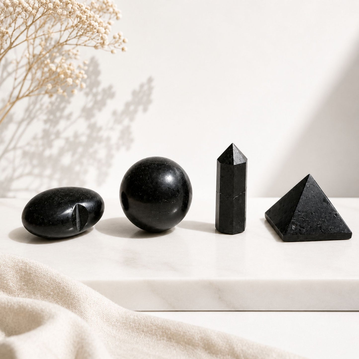 Pierre brute — Quatre formes · Tourmaline noire